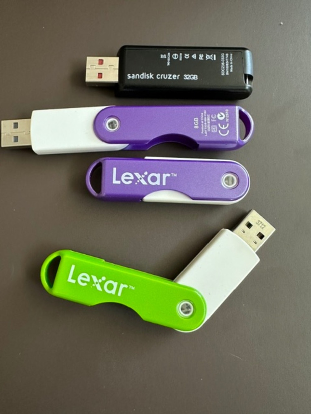 Four  (4) portable USB flash drives 3 (8gb) and 1 (32gb)